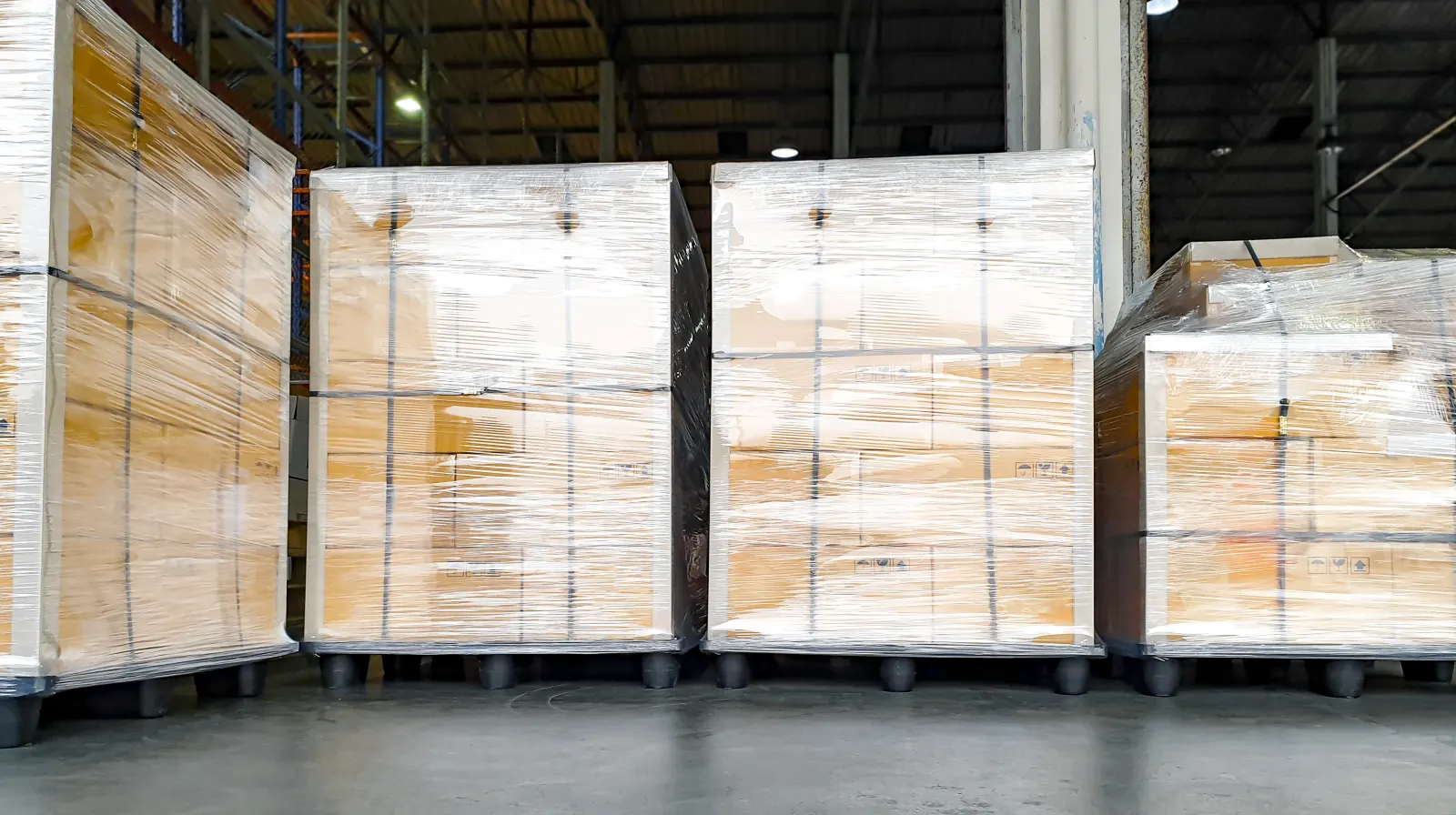 Hand wrap grade stretch film securing a pallet